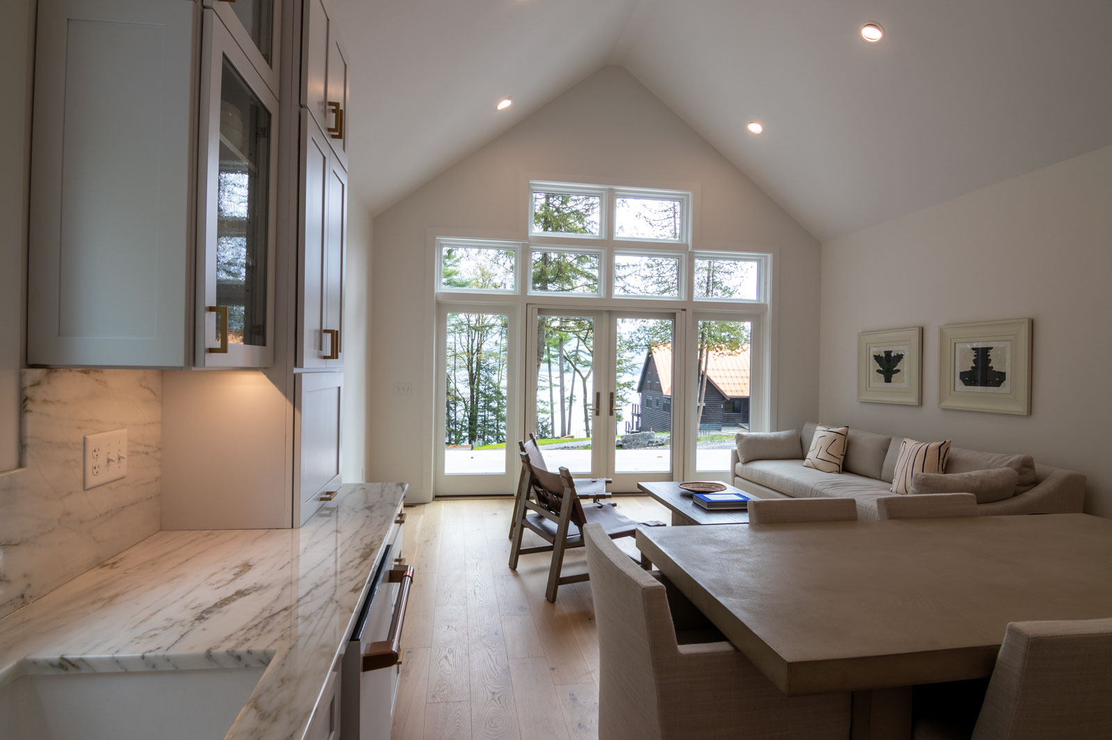 The Rock View living room connects the kitchen to a spacious living space with outdoor porch access. 