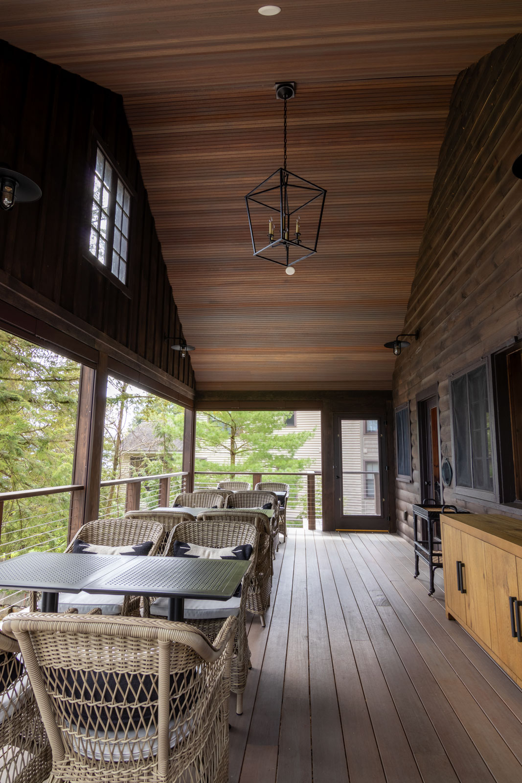 The Rockview Expansion Interior deck space has plenty of room now for the expanded family, and gives incredible views of Lake George Right outside of the living room. 