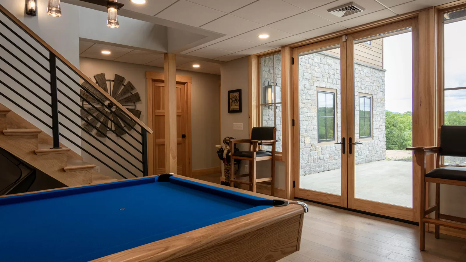 A fully equipped game room is in this custom residential ski lodge.