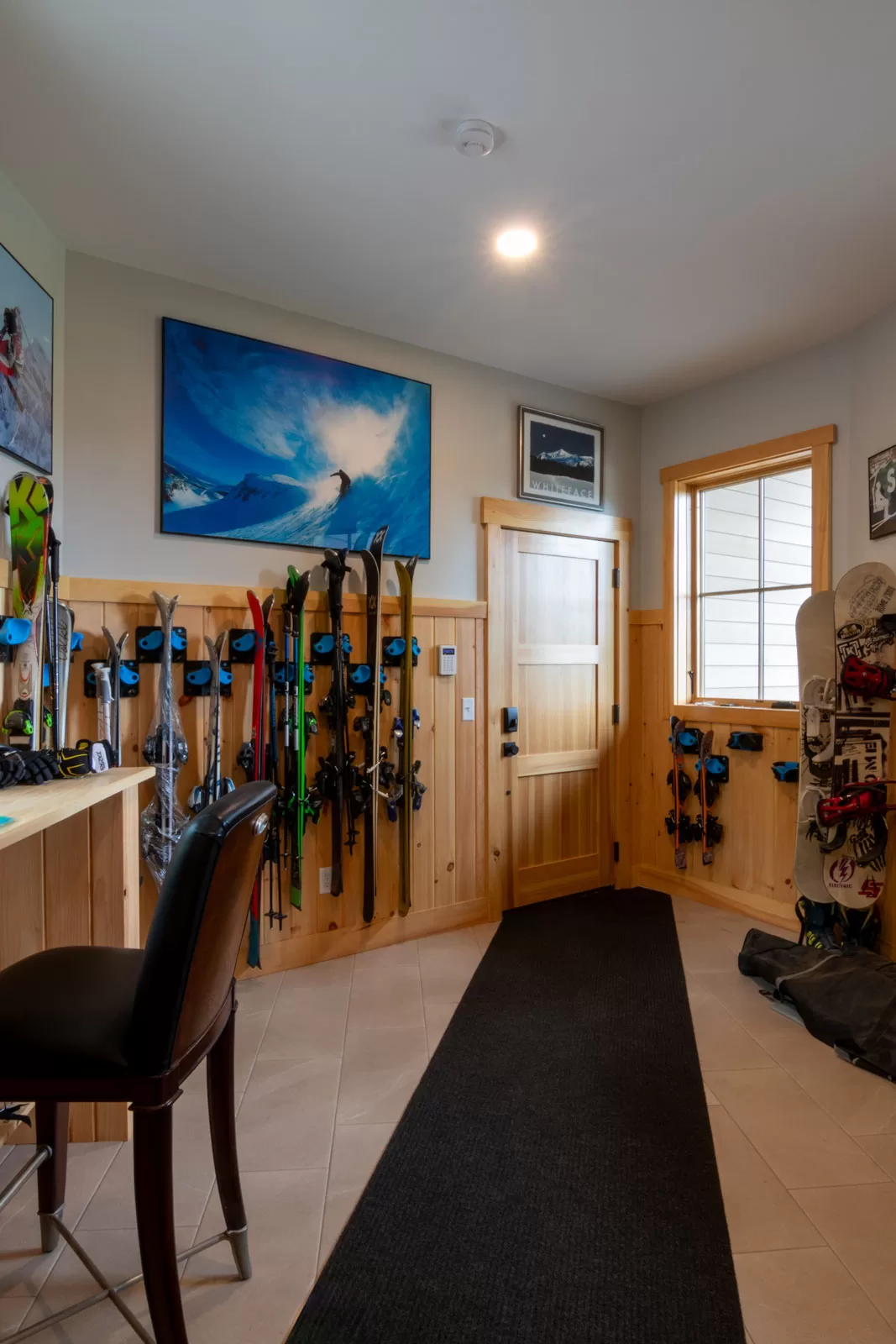 A ski tuning room adjacent to the hockey and ski locker room. 