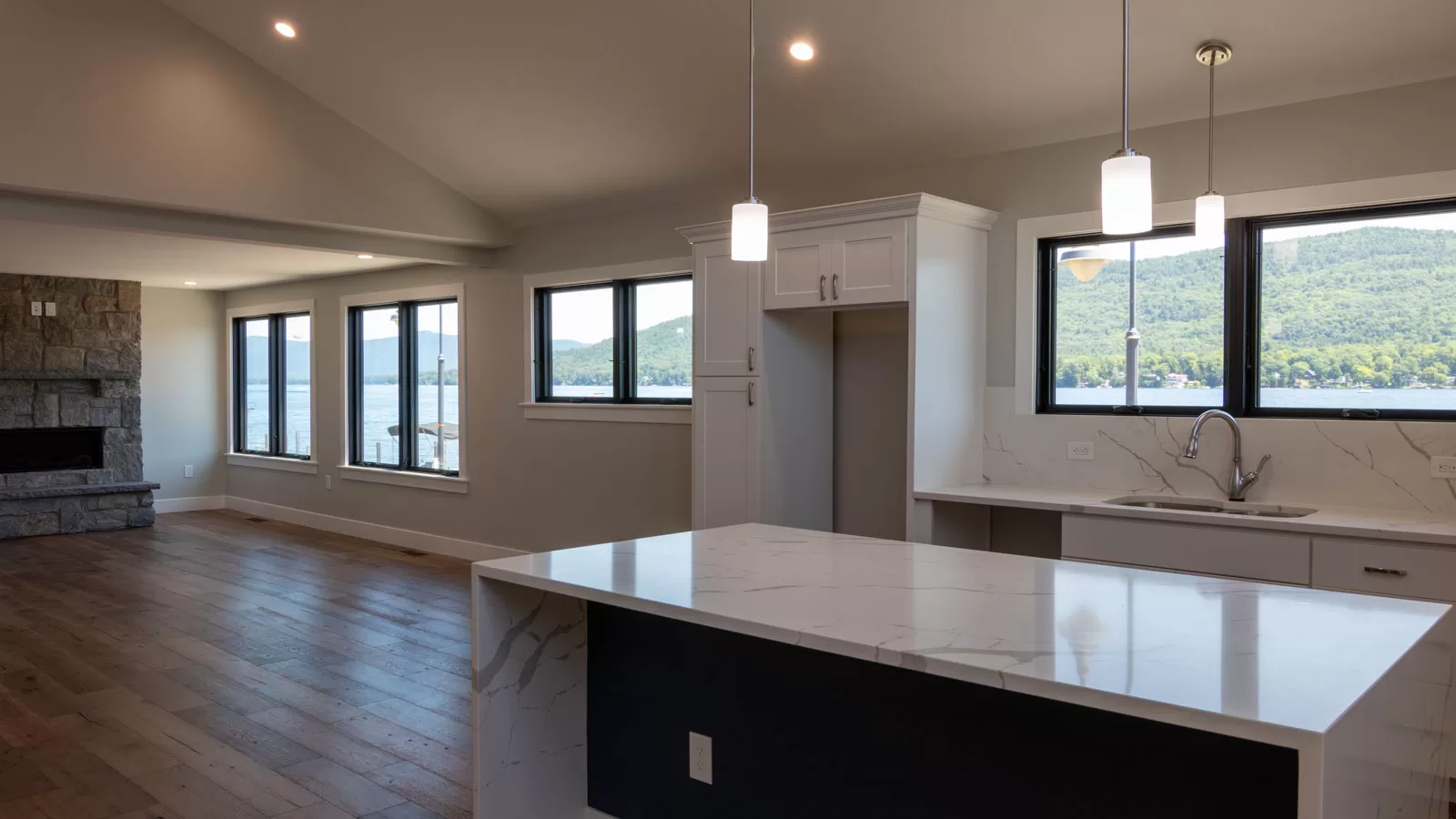 The Anchor kitchens have beautiful quartz countertops, stone fire places in the living space and views of Lake George from every window. 